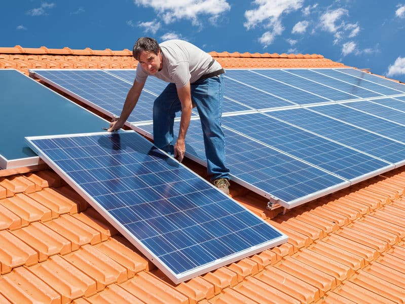 installing alternative energy photovoltaic solar panels